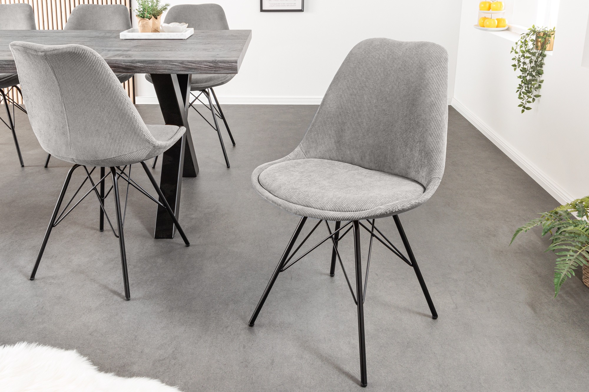 Estila Dizajnová moderná stolička Scandinavia s menčestrovým sivým čalúnením