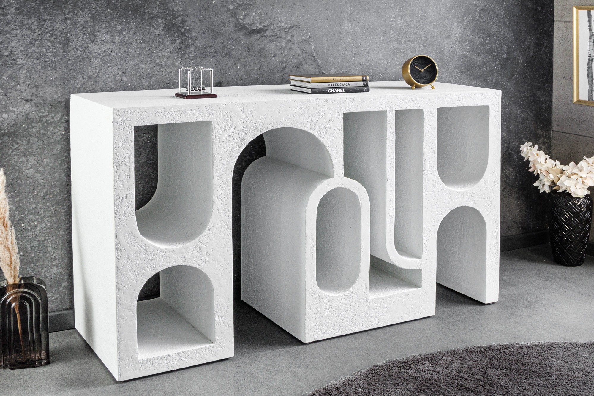 Estila Art deco obdĺžnikový konzolový stolík Gerin v bielej farbe s Koligeometrickým obrazcom 120 cm