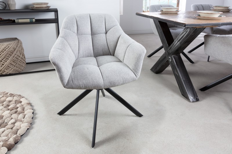 Estila Dizajnová otočná jedálenská stolička Mariposa s čiernymi kovovými nohami a sivým čalúnením 83cm