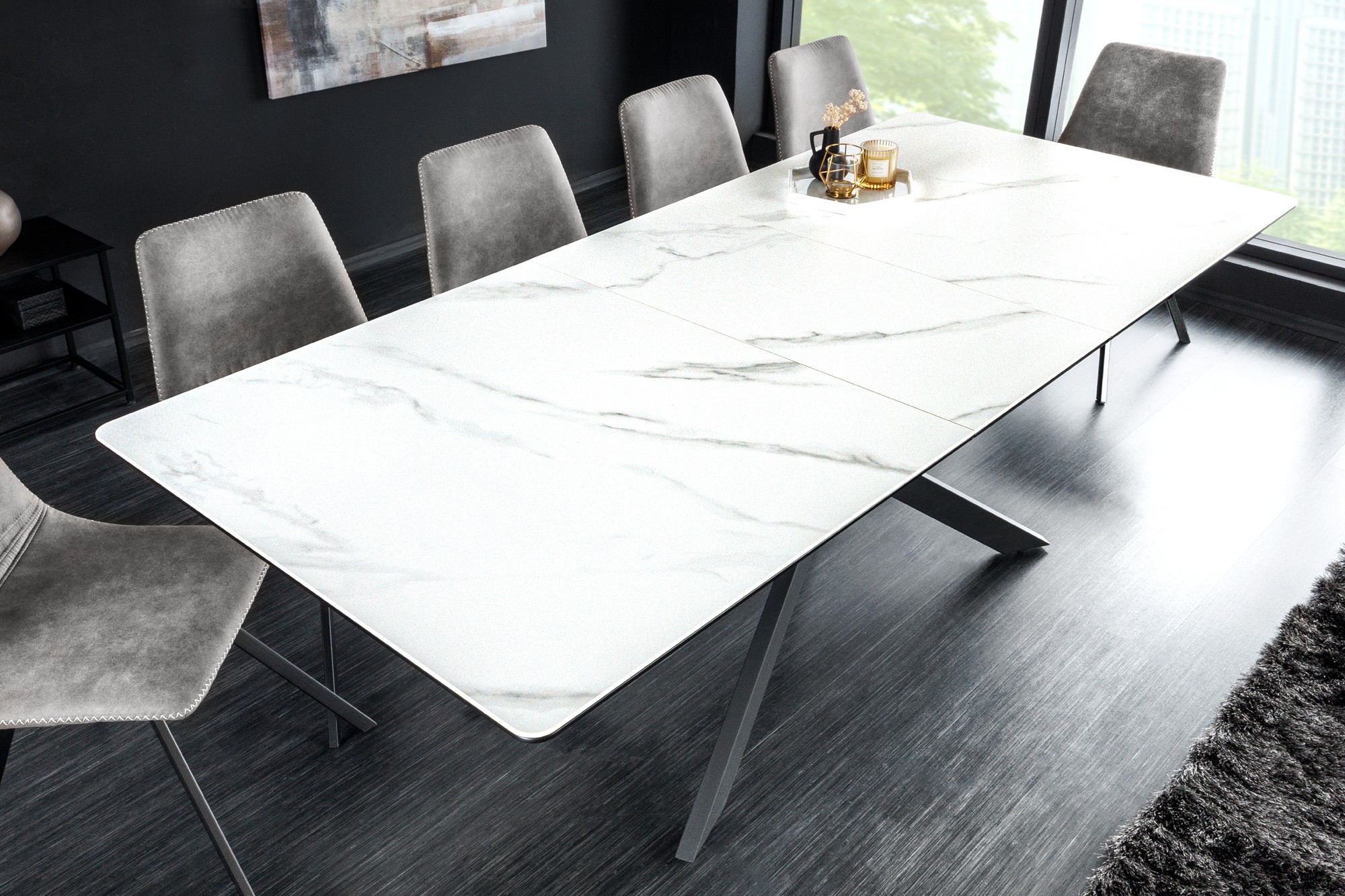 Estila Industriálny obdĺžnikový rozkladací jedálenský stôl Tramontana s čiernymi prekríženými nožičkami bielou mramorovou doskou 160 cm