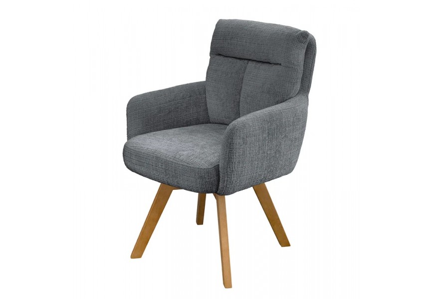 Dizajnové škandinávske otočné jedálenské kreslo Dover so ženilkovým poťahom v sivej farbe so zamatovým leskom s čalúneným opierkovým vankúšom s prešívaním v tvare T s hnedými šikmými nožičkami z bukového dreva