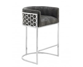 Glamour barová stolička Aurelia Gold so sivým zamatovým poťahom a chrómovou konštrukciou s medovým šesťuholníkovým vzorom