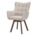 Moderná dizajnová otočná jedálenská stolička Herold v béžovej farbe s čalúnenou chrbtovou s prešívaním s okrúhlymi gombíkmi opierkou s opierkami na ruky s nožičkami z dubového dreva v tmavej hnedej farbe