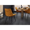 Moderná dizajnová jedálenská stolička Moritz so zamatovým horčicovým žltým prešívaným poťahom a čiernymi nohami 51 cm