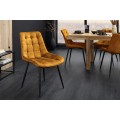 Moderná dizajnová jedálenská stolička Moritz so zamatovým horčicovým žltým prešívaným poťahom a čiernymi nohami 51 cm