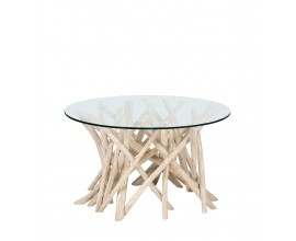Luxusný dizajnový masívny konferenčný stolík Enteo s priehľadnou okrúhlou vrchnou doskou z bezpečnostného skla a organickou podstavou s asymetricky usporiadanými vetvami bieleného teakového dreva v krémovej farbe