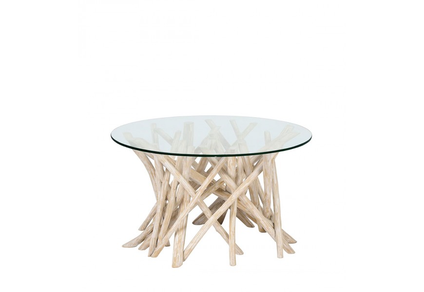 Luxusný dizajnový masívny konferenčný stolík Enteo s priehľadnou okrúhlou vrchnou doskou z bezpečnostného skla a organickou podstavou s asymetricky usporiadanými vetvami bieleného teakového dreva v krémovej farbe