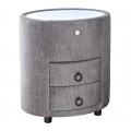 Art deco čalúnený sivý nočný stolík Aluro s poťahom zo zamatu s dvomi zásuvkami s bielou vrchnou doskou so zabudovaným LED podsvietením oválneho tvaru na nízkych čiernych nožičkách