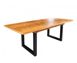 Industri&aacute;lny rozkladac&iacute; jed&aacute;lensk&yacute; st&ocirc;l Perry v obdĺžnikovom tvare z mas&iacute;vneho dreva v hnedej farbe s lakovan&yacute;m povrchom a parketov&yacute;m vzorom s čiernymi kovov&yacute;mi nožičkami