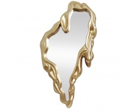 Glamour n&aacute;stenn&eacute; z&aacute;vesn&eacute; zrkadlo Rubia v atypickom tvare s roztopen&yacute;m dizajnom s plastick&yacute;m zlat&yacute;m r&aacute;mom s leskl&yacute;m hladk&yacute;m povrchom