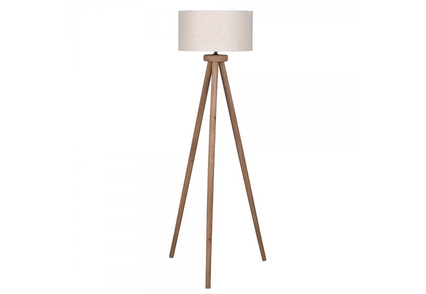 Masívna vidiecka stojaca lampa Ira s tromi nožičkami z mangového dreva v hnedej farbe s valcovým okrúhlym tienidlom z bavlny v béžovej farbe