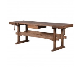 Vintage pracovn&yacute; st&ocirc;l Guria v obdĺžnikovom tvare z mas&iacute;vneho recyklovan&eacute;ho dreva v hnedej farbe so z&aacute;suvkou a dvomi stol&aacute;rskymi svorkami