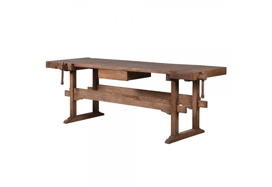 Vintage pracovný stôl Guria v obdĺžnikovom tvare z masívneho recyklovaného dreva v hnedej farbe so zásuvkou a dvomi stolárskymi svorkami