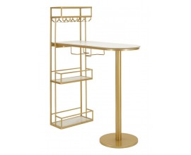 Dizajnov&yacute; zlat&yacute; barov&yacute; pult Bressanine s ov&aacute;lnou vrchnou doskou z bieleho mramoru s kovovou kon&scaron;trukciou s &uacute;ložn&yacute;m priestorom s n&aacute;stenn&yacute;mi policami na fľa&scaron;e s držiakmi na poh&aacute;re s jednou nohou