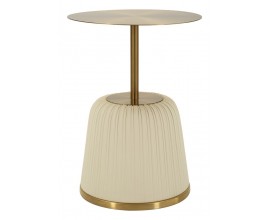 Dizajnový glamour okrúhly príručný stolík Giselle z kovu v zlatej farbe s čalúnenou béžovou koženou podstavou 40 cm
