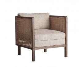 Luxusn&eacute; art deco kreslo Jufam v &scaron;tvorcovom tvare z mas&iacute;vneho mangov&eacute;ho dreva v svetlej hnedej farbe s ratanov&yacute;m v&yacute;pletom a poťahom so &scaron;trukt&uacute;rou v b&eacute;žovej farbe s viedensk&yacute;m v&yacute;pletom