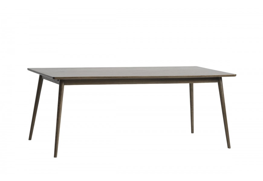 Dizajnový škandinávsky jedálenský stôl Aarhus s rozkladacou obdĺžnikovou vrchnou doskou so zaoblenými rohmi s valcovitými nožičkami so zúžením v spodnej časti v tmavej hnedej farbe z dubového dreva