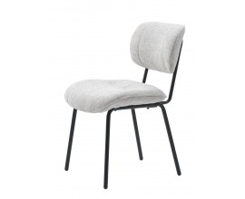 Modern&aacute; bukl&eacute; jed&aacute;lensk&aacute; stolička Hruna so &scaron;t&iacute;hlou čiernou kovovou kon&scaron;trukciou a bielosiv&yacute;m poťahom 83 cm