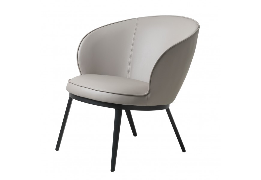 Dizajnové industriálne okrúhle kreslo Gamla so zaoblenou chrbtovou opierkou s vytiahnutými bočnicami a poťahom z ekokože v odtieni taupe v tónoch hnedej a sivej s podstavou z kovu v čiernej farbe so štyrmi štíhlymi nohami