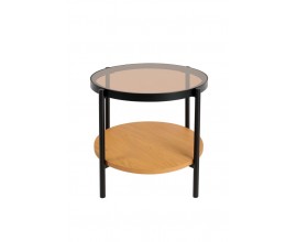 Industri&aacute;lny pr&iacute;ručn&yacute; stol&iacute;k Sonny s okr&uacute;hlou doskou s t&oacute;novan&eacute;ho hned&eacute;ho bezpečnostn&eacute;ho skla s melam&iacute;novou policou v svetlom hnedom dubovom preveden&iacute; s kon&scaron;trukciou z kovu v matnej čiernej farbe so &scaron;tyrmi nohami