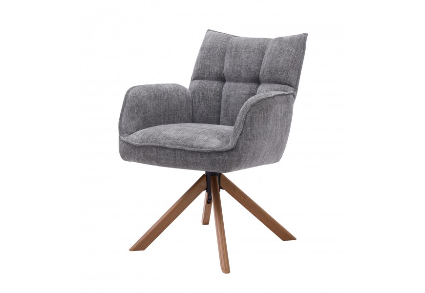 Moderné otočné jedálenské kreslo Laerke s opierkami na ruky s čalúnenou sedacou časťou so ženilkovým poťahom v sivej farbe s lineárnym prešívaním na opierke so štyrmi šikmými nohami z masívneho dubového dreva v prírodnom hnedom prevední