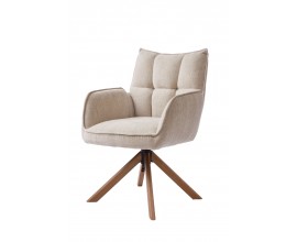 Modern&eacute; &scaron;kandin&aacute;vske jed&aacute;lensk&eacute; kreslo Laerke s otočnou čal&uacute;nenou sedacou časťou so ženilkov&yacute;m poťahom v b&eacute;žovom ľanovom odtieni s pre&scaron;&iacute;van&iacute;m s obdĺžnikov&yacute;m vzorom s opierkami na ruky s podstavou so &scaron;tyrmi &scaron;ikm&yacute;mi nohami v pr&iacute;rodnom hnedom dubovom preveden&iacute;