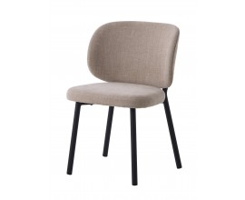 Modern&aacute; dizajnov&aacute; jed&aacute;lensk&aacute; stolička Foxy s poťahom s jemn&yacute;m zamatov&yacute;m ženilkov&yacute;m fini&scaron;om s mel&iacute;rovan&yacute;m efektom v pieskovej b&eacute;žovej farbe s kovov&yacute;mi nohami v čiernej farbe