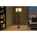 Modern&aacute; stojaca lampa Ambient s ov&aacute;lnym svetl&yacute;m textiln&yacute;m tienidlom a čiernou kovovou kon&scaron;trukciou s podstavou 160 cm  