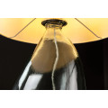 Modern&aacute; sklenen&aacute; stoln&aacute; lampa Glassy s asymetrickou transparentnou nohou a bielym textiln&yacute;m tienidlom 42 cm