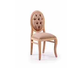 Luxusná elegantná čalúnená stolička Bromo je vyrobená z exotického dreva Mindi, ktoré je veľmi cenené pre svoje vlastnosti