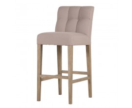 Štýlová moderná barová stolička Leslie s čalúnením a poťahom v béžovej farbe z ľanu bavlny a mikrovlákna s hranatými nožičkami z dubového dreva v hnedej farbe