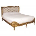 Luxusná zámocká posteľ Roi Gilt s rámom z mahagónového dreva so zlatou povrchovou úpravou a béžovým hodvábnym poťahom na čele postele