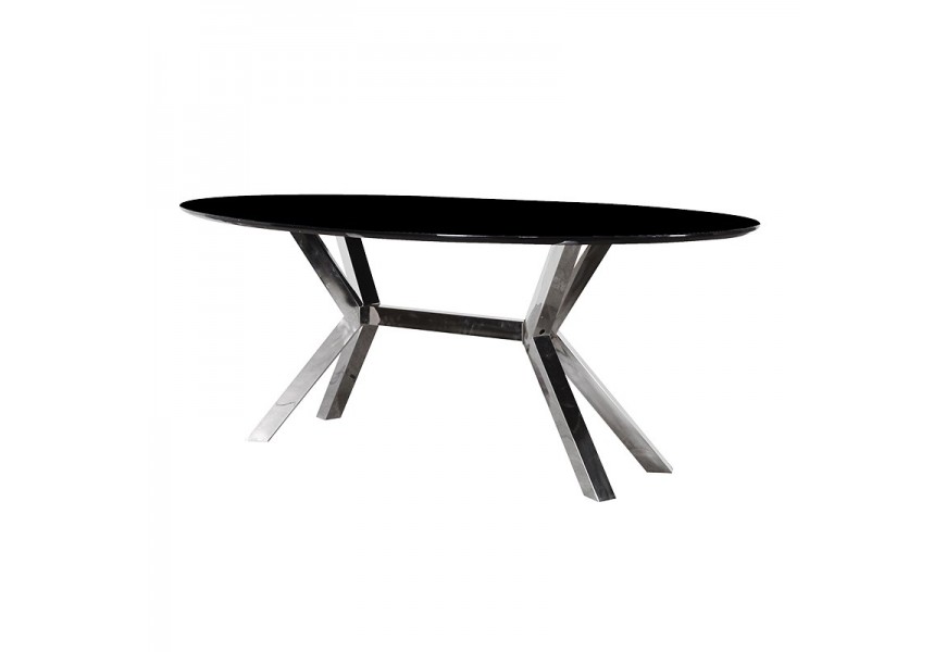 Čierny sklený povrch a nerezové pochrómované nohy robia z tohto jedálenského stolu štýlový nábytok