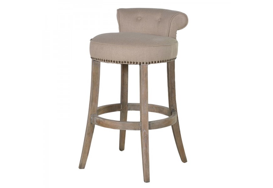 Luxusná vintage barová stolička Clayton v okrúhlom tvare s prešívaným poťahom v béžovej farbe s gombíkmi s nitmi s nožičkami z dubového dreva v hnedej farbe s bielou patinou s čalúnením
