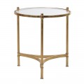 Okrúhly príručný stolík Francine v glamour štýle s transparentnou sklenenou vrchnou doskou a tromi nožičkami prepojenými trojuholníkovou podstavou z kovu v zlatej farbe