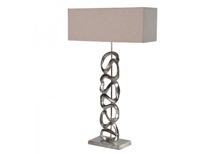 Štýlová art deco stolná lampa Arty s kovovým umeleckým asymetrickým strieborným podstavcom a obdĺžnikovým kapučínovým hnedým tienidlom