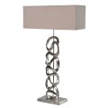 Štýlová art deco stolná lampa Arty s kovovým umeleckým asymetrickým strieborným podstavcom a obdĺžnikovým kapučínovým hnedým tienidlom