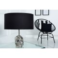 Štýlová glamour okrúhla kovová strieborná stolná lampa Skull s nohou v podobe lebky a čiernym textilným tienidlom 44 cm