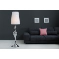 Glamour stojaca lampa Lucie s tvarovanou chrómovou podstavou v striebornej farbe a bielym okrúhlym tienidlom z nylonu 160 cm