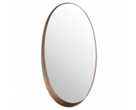 Minimalistické oválne zrkadlo s medeným rámom