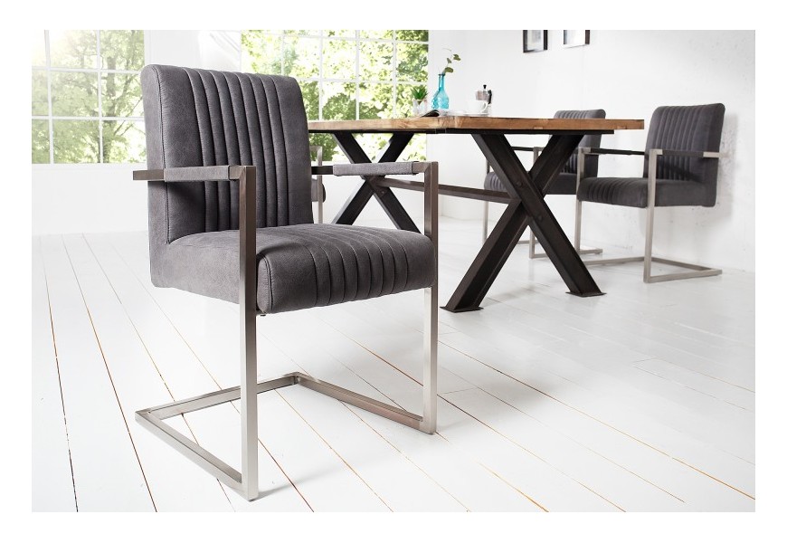 Dizajnová stolička Inspirativo v retro štýle so sivým poťahom z mikrovlákna a s kovovou konštrukciou striebornej farby