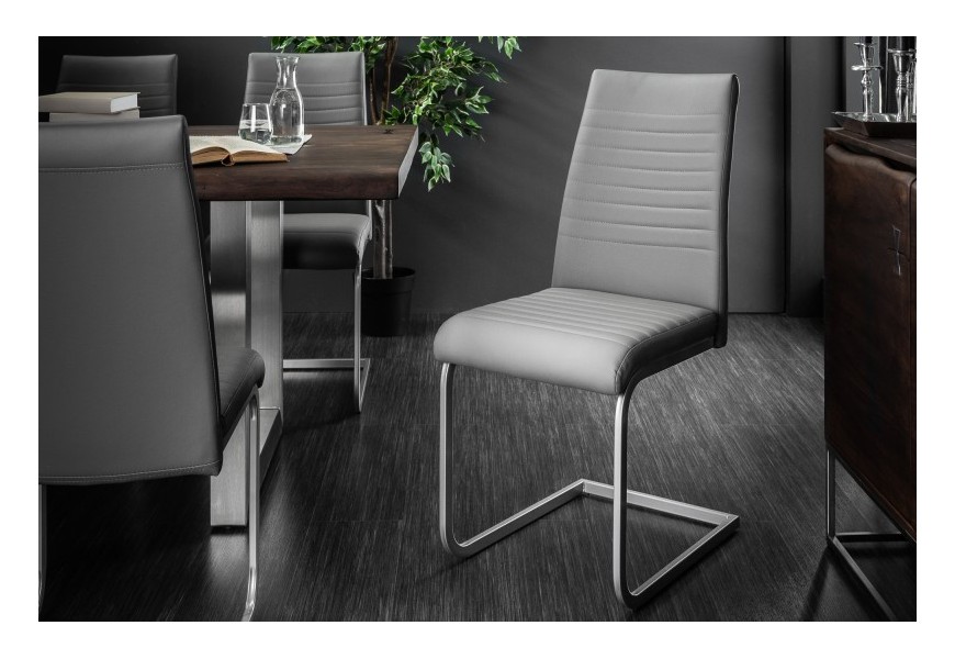 Štýlová dizajnová stolička Gristol v modernom prevedení so sivým poťahom z imitácie kože a s chrómovanými kovovými nohami