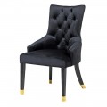 Chesterfield jedálenská čierna zamatová stolička Cheer s prešívaným operadlom a zlatými prvkami na operadle a čiernych nohách