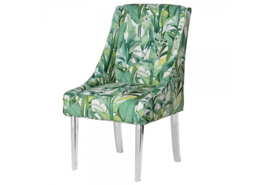 Zelená dizajnová stolička Tica s motívom tropických listov doplnená akrylovými priehľadnými nohami
