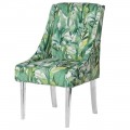 Zelená dizajnová stolička Tica s motívom tropických listov doplnená akrylovými priehľadnými nohami