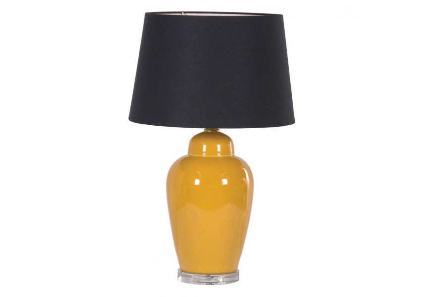 Dizajnová stolná lampa Amarillo s keramickým podstavcom v žltých odtieňoch doplnená čiernym oválnym tienidlom