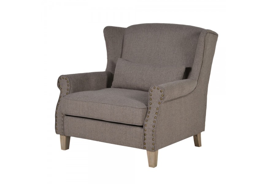 Štýlové kreslo Brown Heringbone v sivej farbe s dizajnovými kovovými cvokmi a masívnymi nožičkami