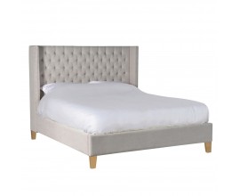 Luxusná béžová Chesterfield posteľ Heidy s ľanovým poťahom a bledými drevenými nohami 194cm