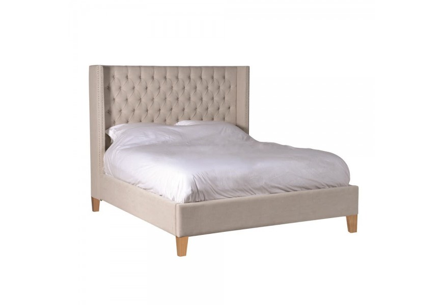 Štýlová čalúnená posteľ Heidy II s ľanovým poťahom a beldými drevenými nohami