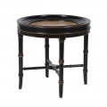 Exkluzívny koloniálny príručný stolík Savannah kruhového tvaru z masívneho dreva s vyrezávanými nohami v čiernej farbe